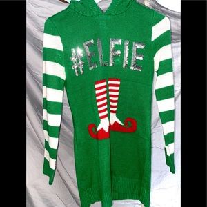 Ugly sweater. (That’s cute)